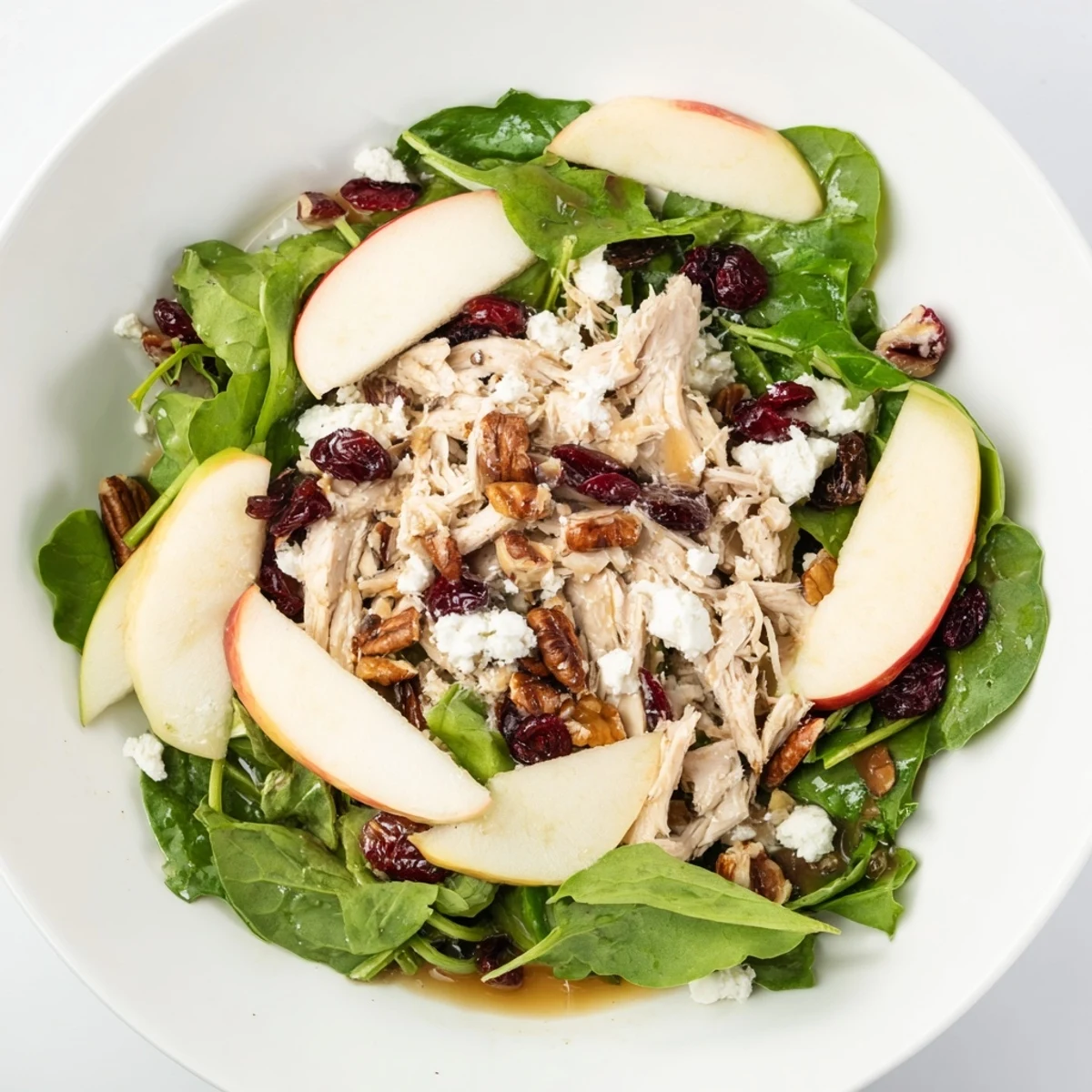 Chicken and Apple Salad showcases tender chicken, crisp apples, pecans, and apple cider dressing, ready to eat.