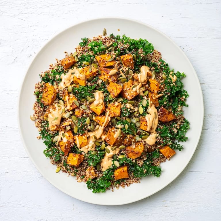 Vibrant image of a freshly-made Light Coastal Bowl, showing roasted sweet potatoes atop fluffy quinoa.