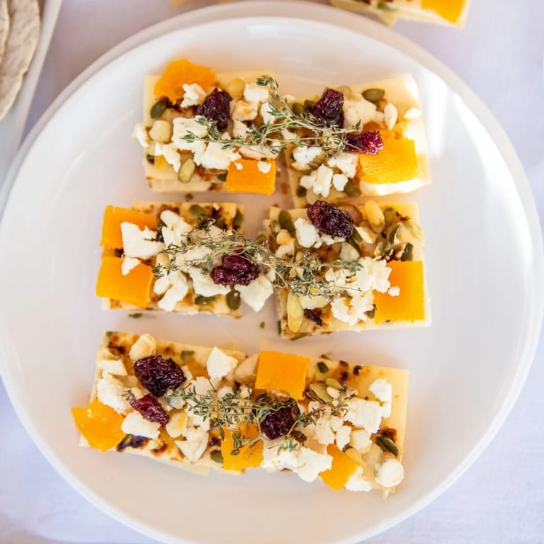 Get ready for the delicious Serengeti Sunset, a beautiful appetizer with apricot and Gouda bands.